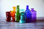 assorted color translucent glass containers