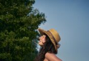 a woman in brown hat