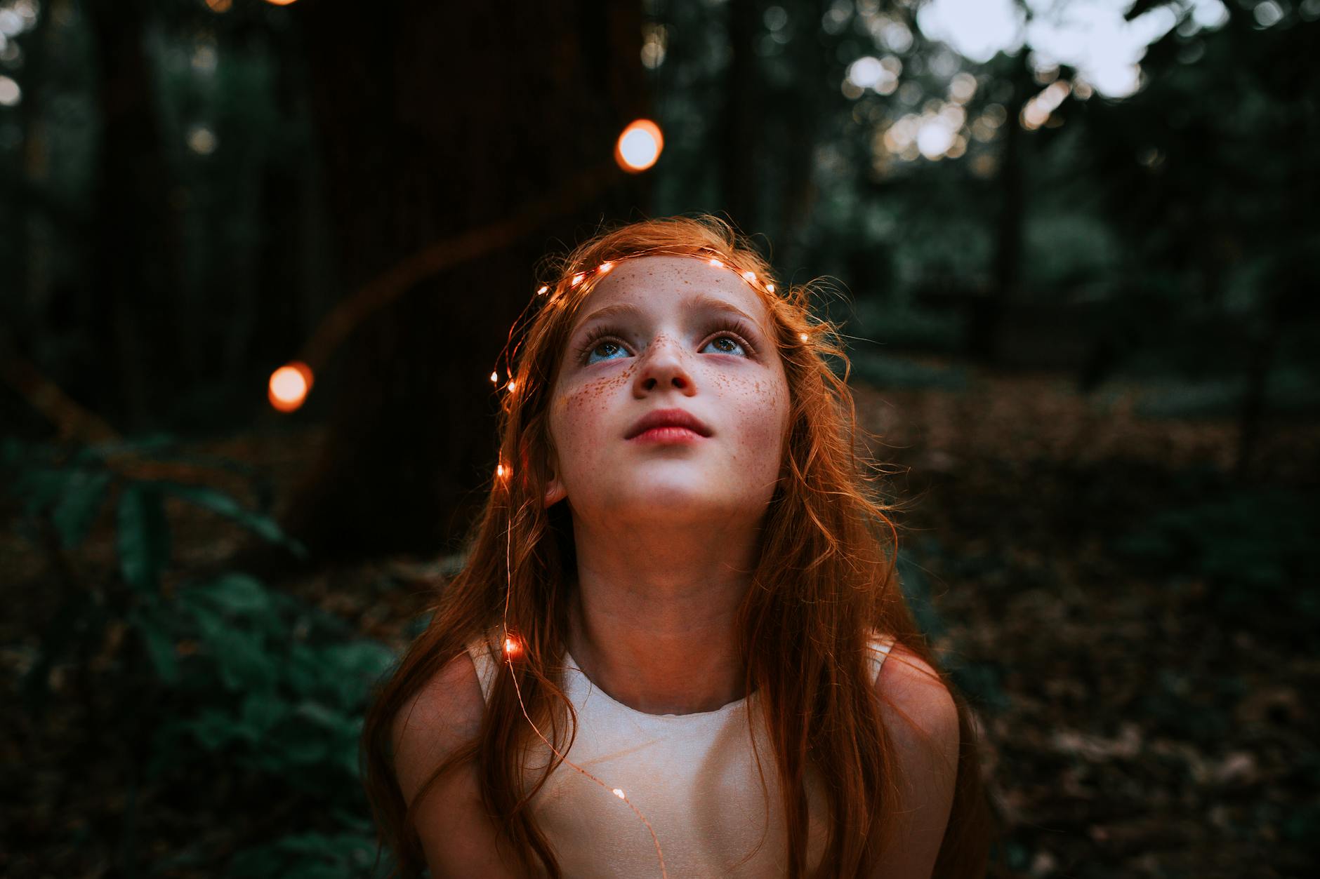 redhead girl looking up